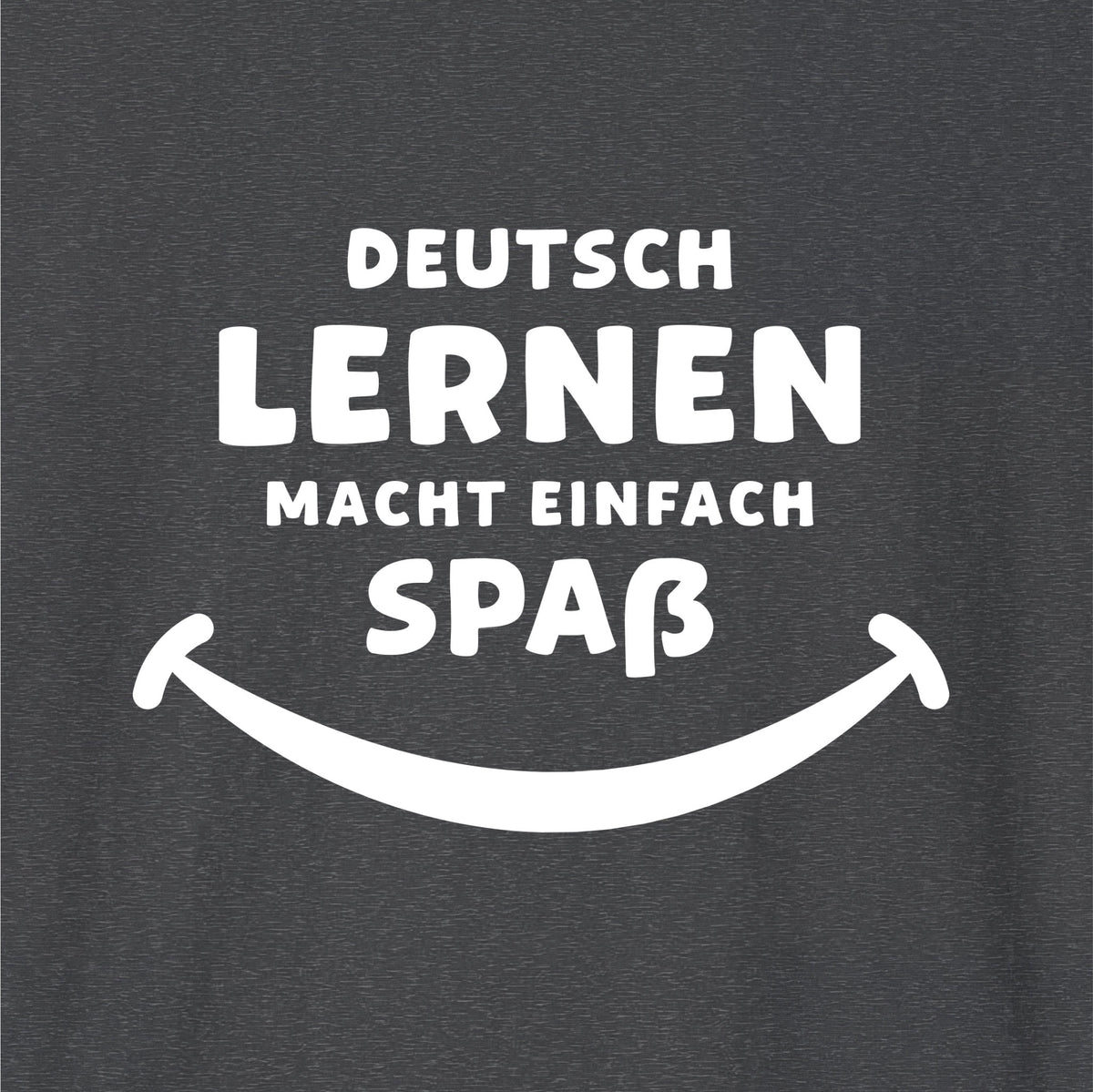 Close-up of Dark Heather German learner T-shirt featuring the “Deutsch Macht Spa” print
