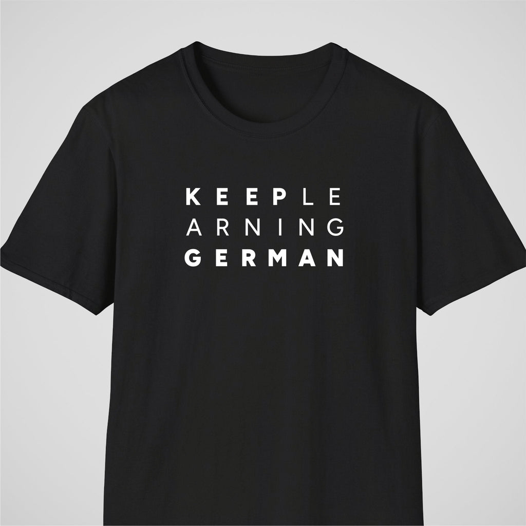 Black German learner T-shirt featuring the “Keep Learning German” design