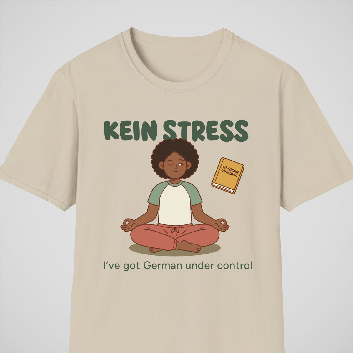 Sand German learner T-shirt featuring the “Kein Stress” design