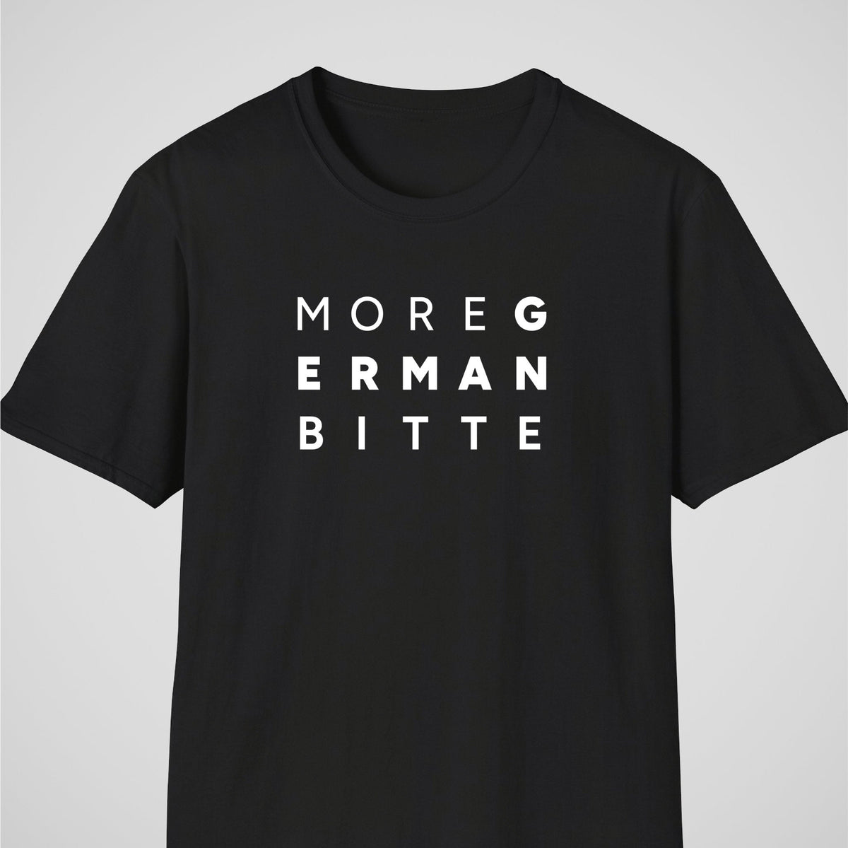 Black German learner T-shirt featuring the “More German Bitte” design